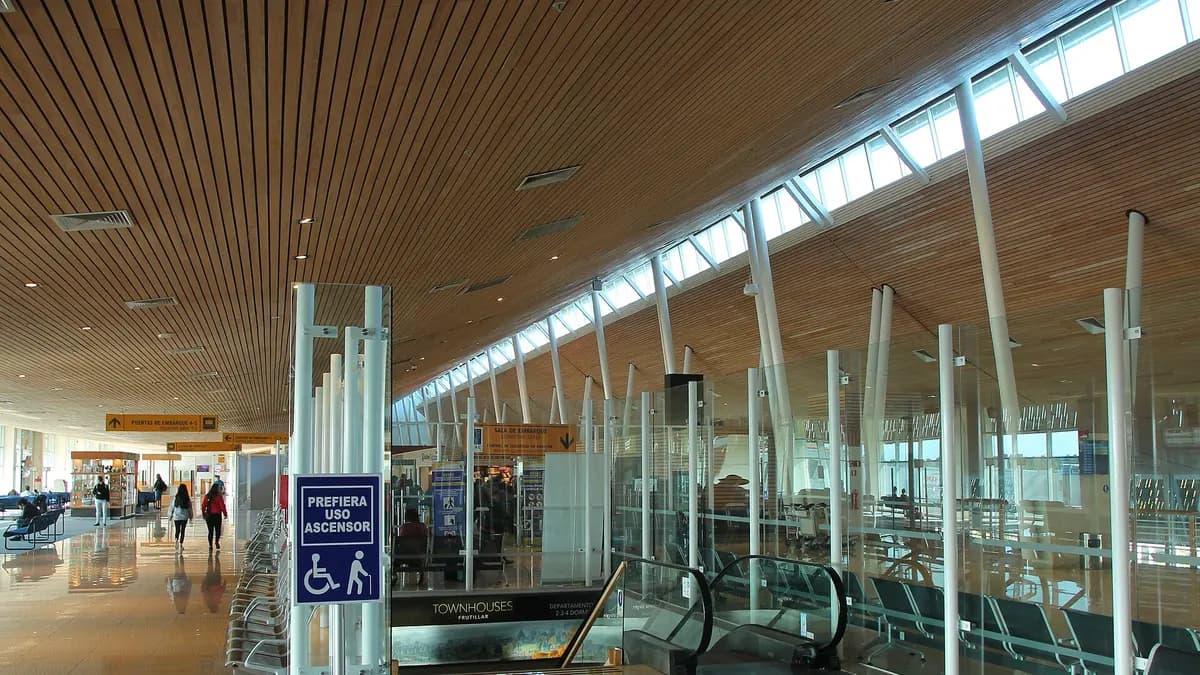 Interior of the El Tepual airport terminal in Puerto Montt with large windows